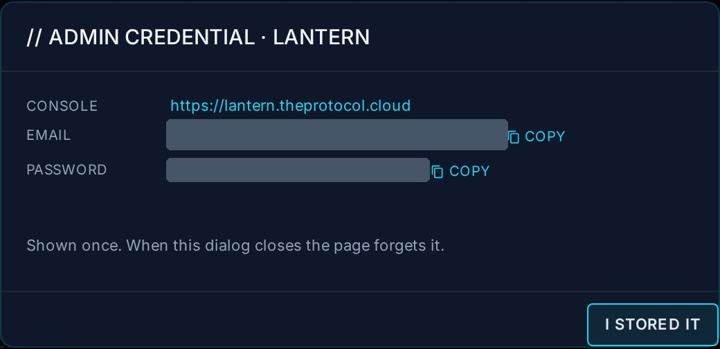 The same dialog after Show it once: the console address lantern.theprotocol.cloud, the email and the password each covered by a grey bar for this picture, copy buttons beside them, the line shown once, when this dialog closes the page forgets it, and a button labelled I stored it.